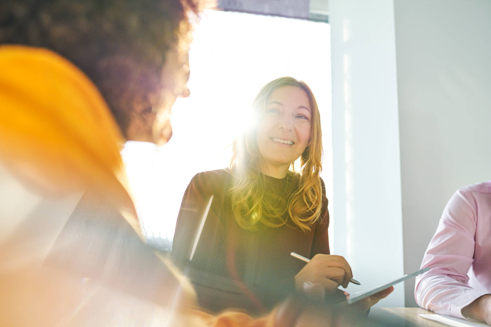 women talking in meeting